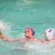Olympic water polo played in greenish water. Photo credit: Tom Pennington/Getty
